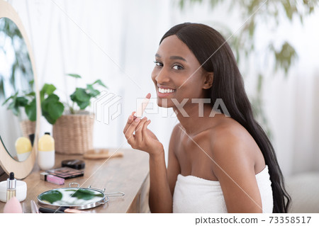 Lips care, day makeup and beauty care at home during quarantine 73358517