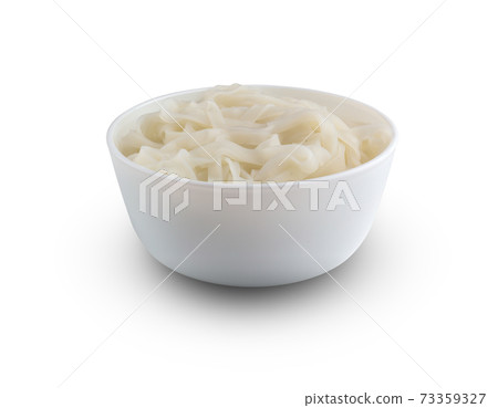 Rice noodles in a plate. Boiled rice noodles in a plate on a white background. 73359327