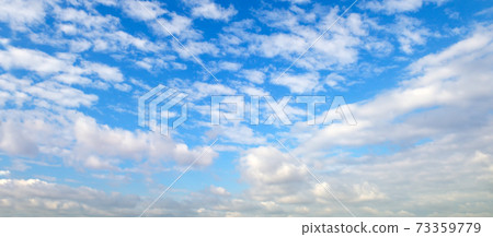 Blue sky with white clouds.Wide photo. Blue sky with white clouds.Wide photo. 73359779