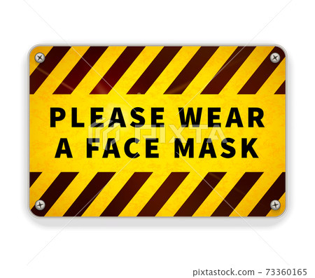 Bright glossy yellow and black metal plate, please wear a face mask, warning sign on white 73360165