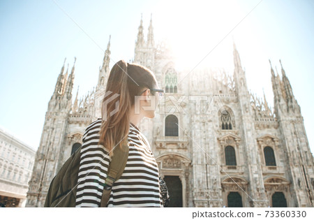 Tourist near the Duomo in Milan Tourist near the Duomo in Milan 73360330