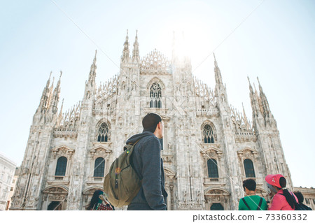 Tourist near the Duomo in Milan Tourist near the Duomo in Milan 73360332
