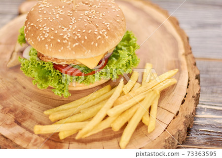 Fresh tasty burger and french fries. 73363595
