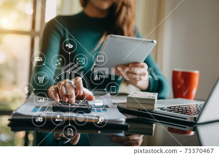 Businessman working with smart phone and laptop and digital tablet computer in  office with digital marketing media  in virtual icon 73370467