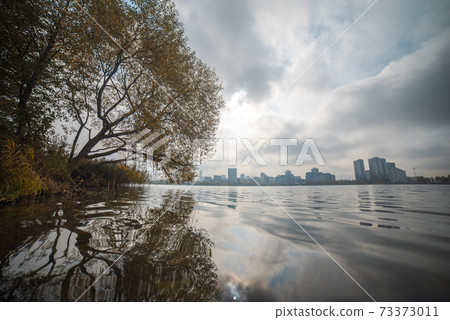 View of the city of Minsk across the river. 73373011