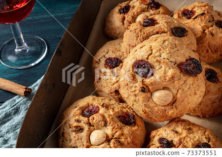 Homemade cookies in a baking tray, funny face biscuits Homemade cookies in a baking tray, funny face biscuits 73373551