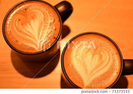 Two mugs of heart latte art Two mugs of heart latte art 73373555