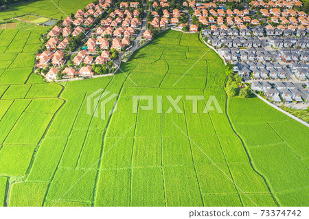 Aerial of housing subdivision or development. Aerial of housing subdivision or development. 73374742