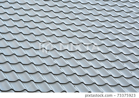 Modern grey roof made of corrugated metal Modern grey roof made of corrugated metal 73375923