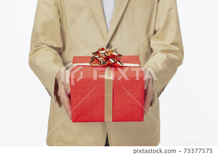 Men's hand with gifts Men's hand with gifts 73377575