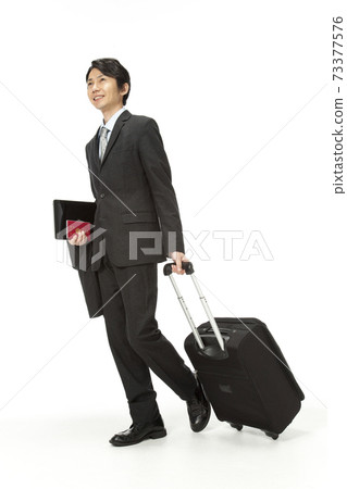Businessman of overseas business trip image 73377576