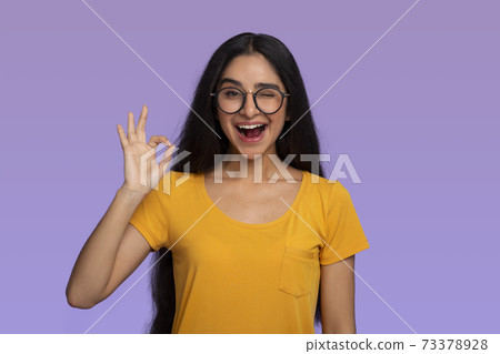 Happy insian woman gesturing ok sign and smiling Happy insian woman gesturing ok sign and smiling 73378928