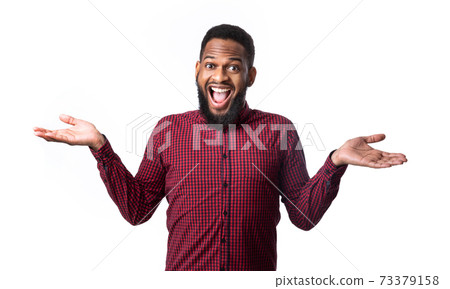 Excited African American Man Shouting Looking At Camera, White Background Excited African American Man Shouting Looking At Camera, White Background 73379158