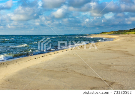 ships on the sea horizon, Baltic sea coast, small waves on the sea ships on the sea horizon, Baltic sea coast, small waves on the sea 73380592