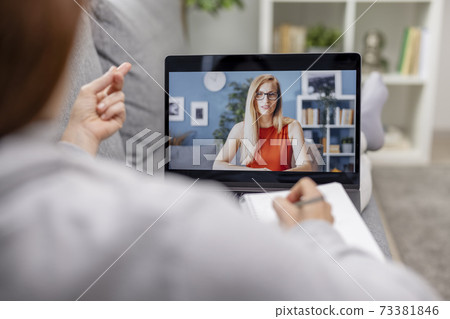 Using Video Chat on Laptop 73381846