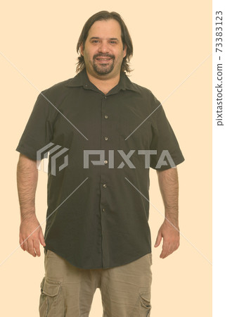 Happy fat Caucasian man smiling 73383123