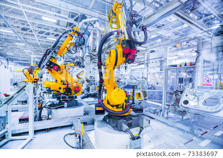 robots in a car factory 73383697