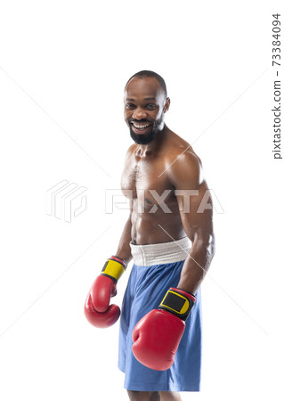 Bright emotions of professional boxer isolated on white studio background, excitement in game 73384094