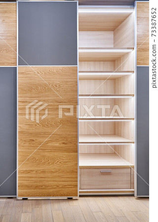 Wardrobe with LED lighting, sliding doors and inner case of light laminated particle boards 73387652