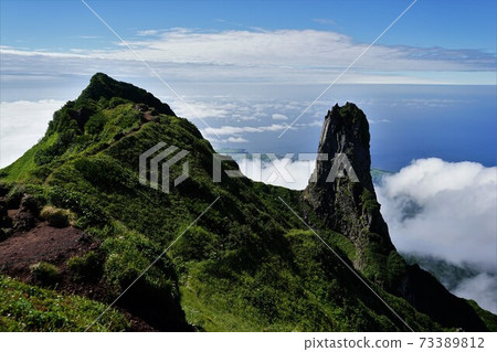 Candle rock and main peak of Mt. Rishiri 73389812