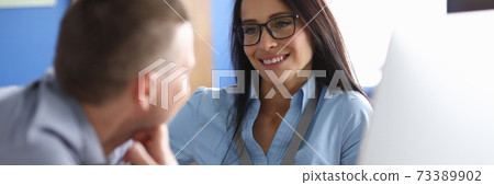 Woman spending funny time in office Woman spending funny time in office 73389902