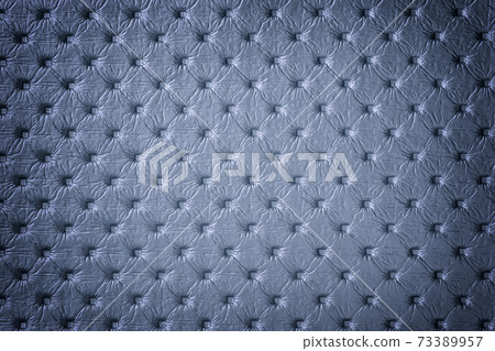 Texture of light blue leather background with capitone pattern with vignette. Texture of light blue leather background with capitone pattern with vignette. 73389957