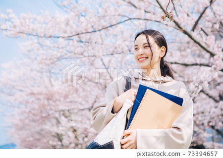 Cherry blossoms and university students 73394657