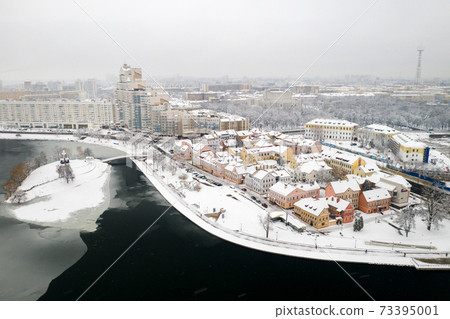 Snow-covered city center of Minsk from a height. The upper city. Belarus 73395001