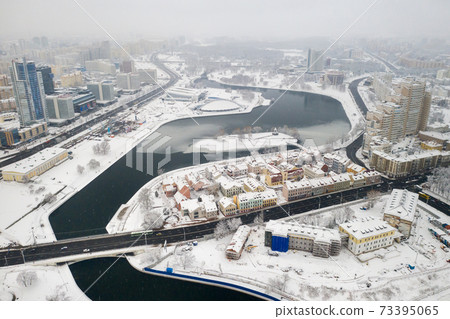 Snow-covered city center of Minsk from a height. The upper city. Belarus 73395065