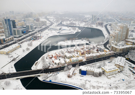 Snow-covered city center of Minsk from a height. The upper city. Belarus 73395067