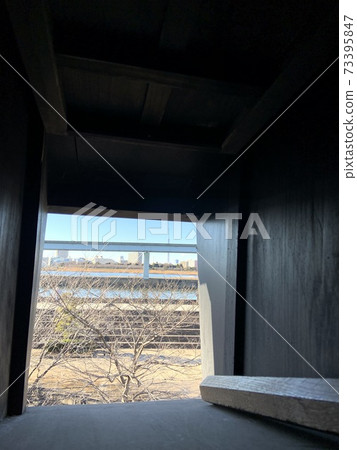 Arakawa and Sky Tree peeking through the small window of the fire lookout tower Winter scenery Arakawa and Sky Tree peeking through the small window of the fire lookout tower Winter scenery 73395847