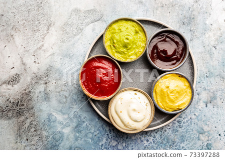 Set of different dip sauces Set of different dip sauces 73397288