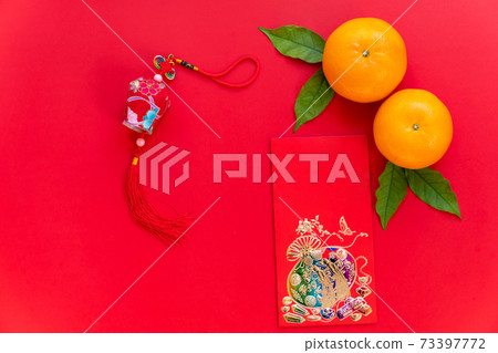 Red envelope put on red background, red envelope and chinese lantern  such as chinese new year. 73397772
