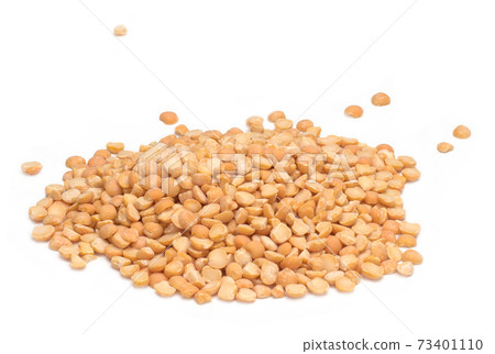 Peas, dry yellow chopped peas on white background Peas, dry yellow chopped peas on white background 73401110