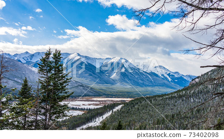 Banff National Park beautiful landscape in winter. Frozen Vermilion Lakes and Snow-covered Canadian Rocky Mountains. Alberta, Canada. 73402098