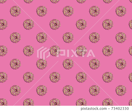 Pink doughnuts with hearts seamless pattern on pink background Pink doughnuts with hearts seamless pattern on pink background 73402330