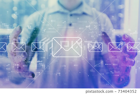 Email concept with young man Email concept with young man 73404352