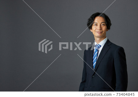 Young businessman portrait Young businessman portrait 73404845