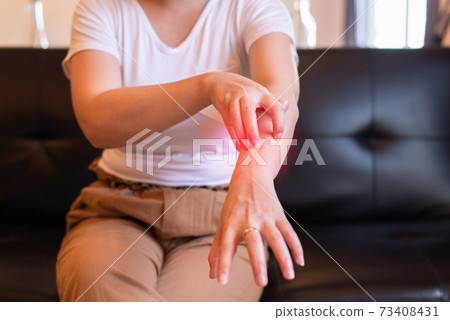Woman with rash or papule and scratch on her arm from allergies,Health allergy skin care problem Woman with rash or papule and scratch on her arm from allergies,Health allergy skin care problem 73408431