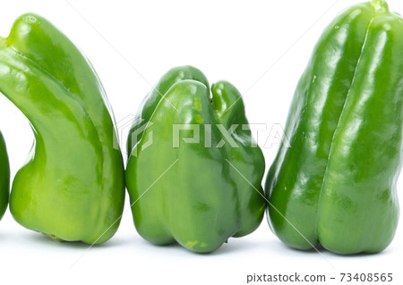 Multiple peppers white background Multiple peppers white background 73408565