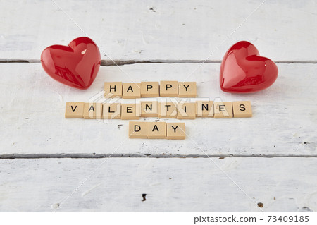 HAPPY Valentine's day text on white wood HAPPY Valentine's day text on white wood 73409185
