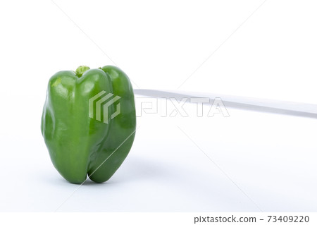 Pepper kitchen knife cut white background 73409220
