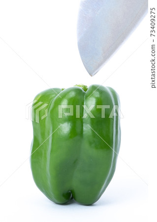 Pepper kitchen knife cut white background 73409275