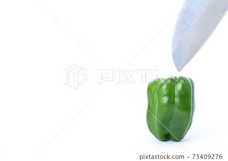 Pepper kitchen knife cut white background 73409276