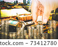 Exposure of Finance and Saving money banking concept,Hope of investor concept,Male hand putting money coin like stack growing business. background the city 73412780