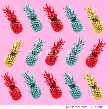 Photo of colorful pineapples on a retro background 73412849