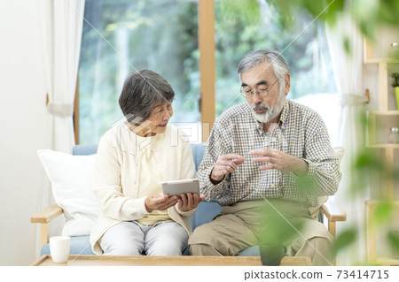Senior women using tablets Senior women using tablets 73414715