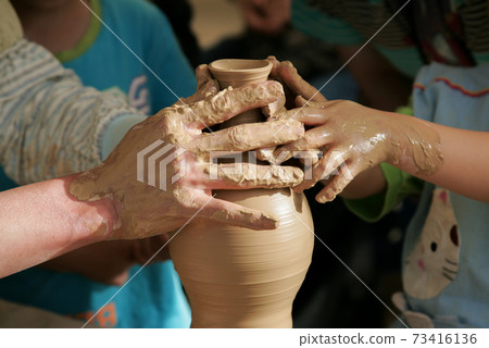 Making pottery Making pottery 73416136