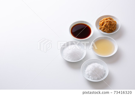 Japanese seasonings on a white background Japanese seasonings on a white background 73416320