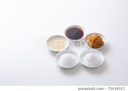Japanese seasonings on a white background Japanese seasonings on a white background 73416321